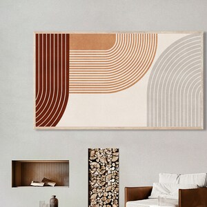 May include: Abstract art print with geometric shapes in shades of brown, orange, and gray. The print features curved lines and a white background.