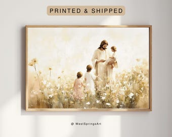 Puede incluir: Una impresión artística enmarcada que representa una escena religiosa. Muestra una figura con túnicas blancas sosteniendo a un niño, rodeada de otros niños en un campo de flores. La obra de arte tiene una paleta de colores suaves y cálidos con el texto "PRINTED & SHIPPED".