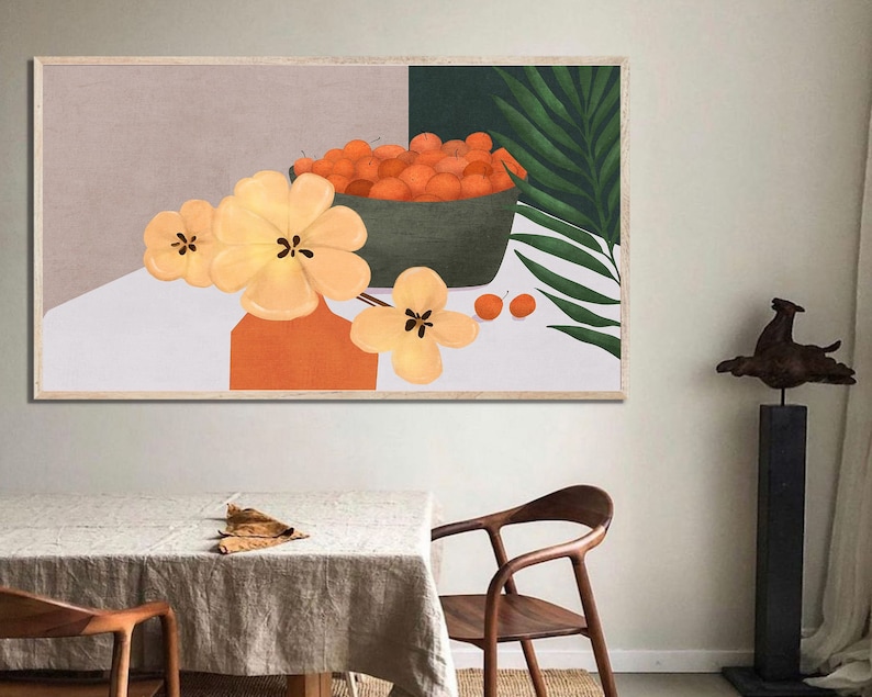 May include: A framed illustration of a bowl of oranges with a green leafy plant and yellow flowers in a vase. The background is a light gray color.