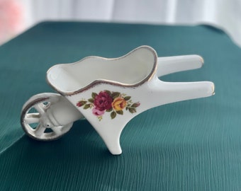 Vintage Cottage Rose Fine Bone China Wheelbarrow Ornament dimensions are approx. Length 5.5 inches x Height 3 inches x Width 2 inches