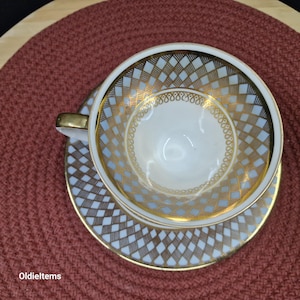 Vintage Seltmann Weiden Floral Teacup and Saucer: Maroon Scalloped Edge