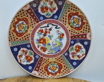 Assiette vintage Imari 16 cm avec des motifs d'oiseaux et de fleurs avec des peintures encadrées