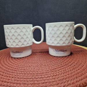 Vintage Nederland Promotional Cups - Set of 2. This charming set includes two vintage promotional cups from Nederland, ...