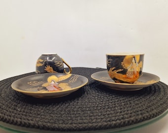 Set of 2 Embossed Black TCoffee eacup and Saucer with golden trim