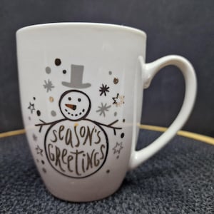 Snowman Christmas Mug: Season&#39;s Greetings Ceramic Holiday Decor