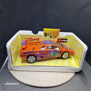 Italian Vintage 1/18 Rare Disney Daisy Burago Lamborghini Diablo Monster Model Car, good condition, working moving parts, with box. Used Box
