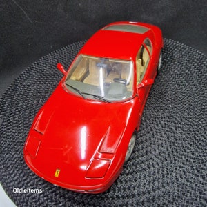 Burago Model Car Ferrari 456 GT (1992) in red color, a 1/18 scale model Die Cast, used but in Perfect Condition but without a box