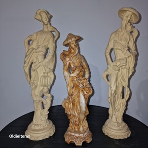 3 Statues of Chinese People, a pair height of 50 cm and one of 40 cm handmade by heavy resin