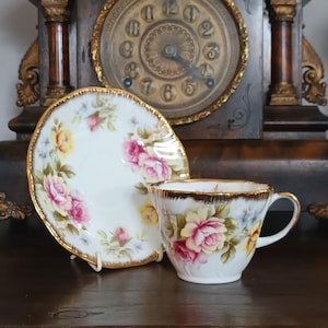 Beautiful Vintage English Rosina Queens  bone china  teacup and saucer teaset pink rose gold C1960s in lovely condition