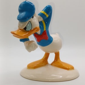 Rare Hard To Find Vintage Royal Doulton Donald duck Disney&#39;s 70th Anniversary Edition Figurine in fabulous condition in original box