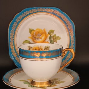 Beautiful Vintage Rare Stanley English bone china Trio , Teacup Saucer and Teaplate  Set. Teal colour and Gold handle C1940s super condition