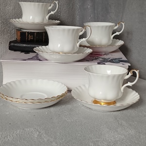 Lovely 10 piece collection of Vintage Classic Royal Albert &quot;Val Dor&quot; English bone china 4 cups and 6 saucers C1980s