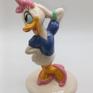 Rare Hard To Find Vintage Royal Doulton Daisey duck Disney&#39;s 70th Anniversary Edition Figurine in fabulous condition in original box
