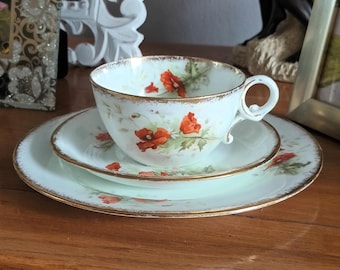 Beautiful rare Victorian English fine china trio tea set in a fabulous Poppy design with gold edging C1890s in lovely condition