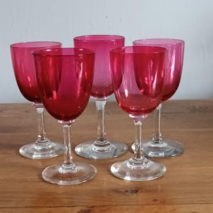 Fabulous set of 5 Victorian / Edwardian  hand blown Cranberry  wine or sherry glass C1890s / 1930s in lovely condition