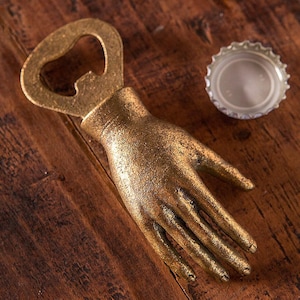 Hand Ancient Bottle Opener