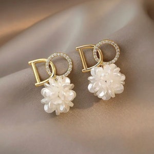 Cc earrings Etsy UK