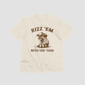 Rizz Em With The Tism Unisex T-Shirt, Funny Raccoon Graphic Tee, Retro Raccoon Meme Tee Shirt, Funny Gift T-Shirt for Women And Men