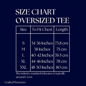 May include: Size chart for an oversized tee, with measurements in inches and centimeters. Sizes range from S to XXL, with chest measurements from 34-36 inches to 48-50 inches, and lengths from 73.8 cm to 80 cm. The chart is on a dark blue background.