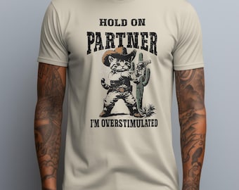Funny Cowboy Cat Tee Shirt, Funny Meme Quotes Trendy T-Shirt, Weird Stuff Meme Tee Shirt, Hold On Partner Im Overstimulated Unisex T-Shirt