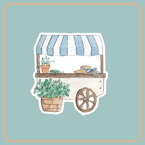 以下が含まれることがあります： 青と白のストライプの天蓋が付いた市場のカートの水彩イラスト。カートには、青いリボンが付いた麦わら帽子、鉢植えの植物、緑でいっぱいの柳のバスケットがあります。