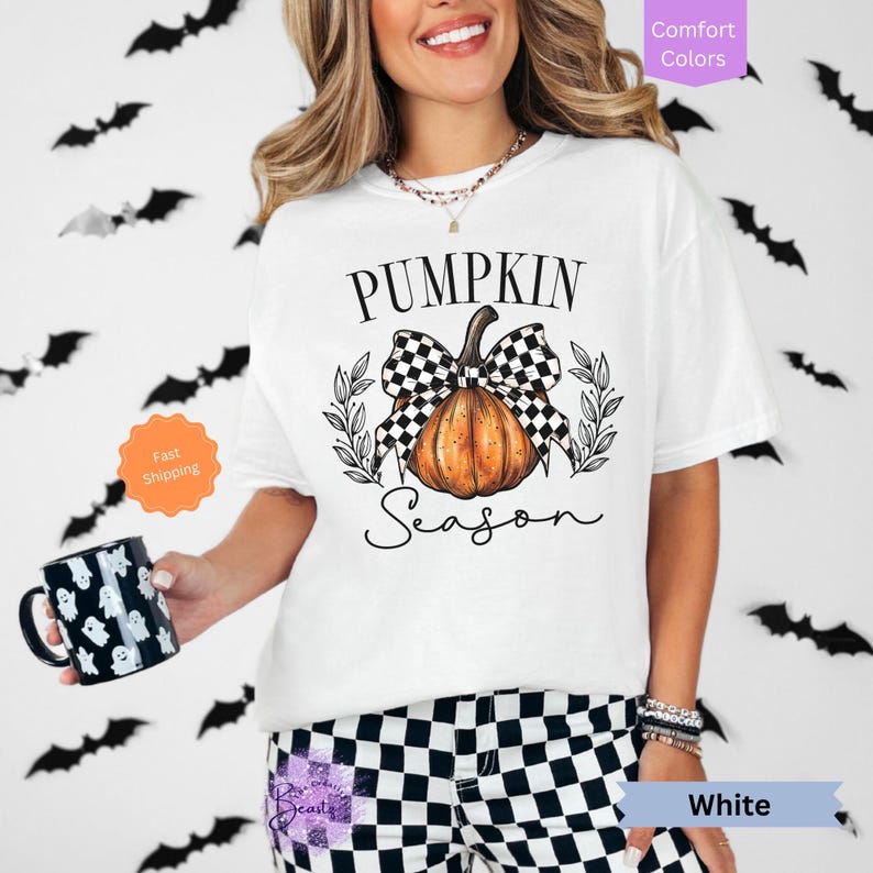 May include: White t-shirt with a black and white checkered bow on a pumpkin with the text "Pumpkin Season".