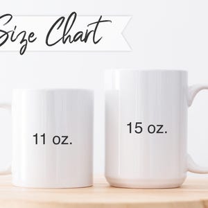 May include: Two white ceramic mugs with black text. The smaller mug is 11 oz and the larger mug is 15 oz.