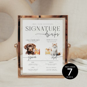 May include: A printable wedding sign with a white background and black text. The sign says "Signature Drinks" and lists the groom's drink as an "Old Fashioned" and the bride's drink as an "Amaretto Sour". The sign also includes a list of beer, wine, spirits, and non-alcoholic drinks. The sign is decorated with a watercolour illustration of a dog and a cat.