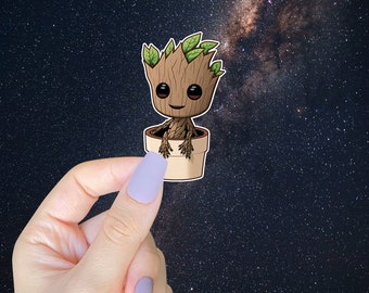 May include: A brown and green cartoon character with a pot on its head, against a dark blue background with white stars.