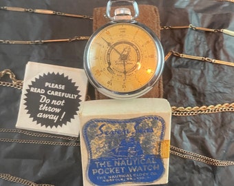 Ingraham Seven Seas nautical pocket watch. NOS and runs as it should 1930s