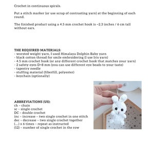 May include: Crochet pattern instructions for a white amigurumi bunny with black eyes. The pattern includes a list of materials and abbreviations. The finished bunny is about 2.3 inches tall.