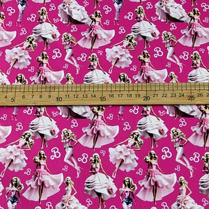 Barbie Power Girl pink cotton poplin fabric for creative sewing