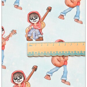 May include: A blue and white fabric with a repeating pattern of a cartoon character playing a guitar. The character is wearing a red hooded jacket, blue jeans, and a skull face paint.