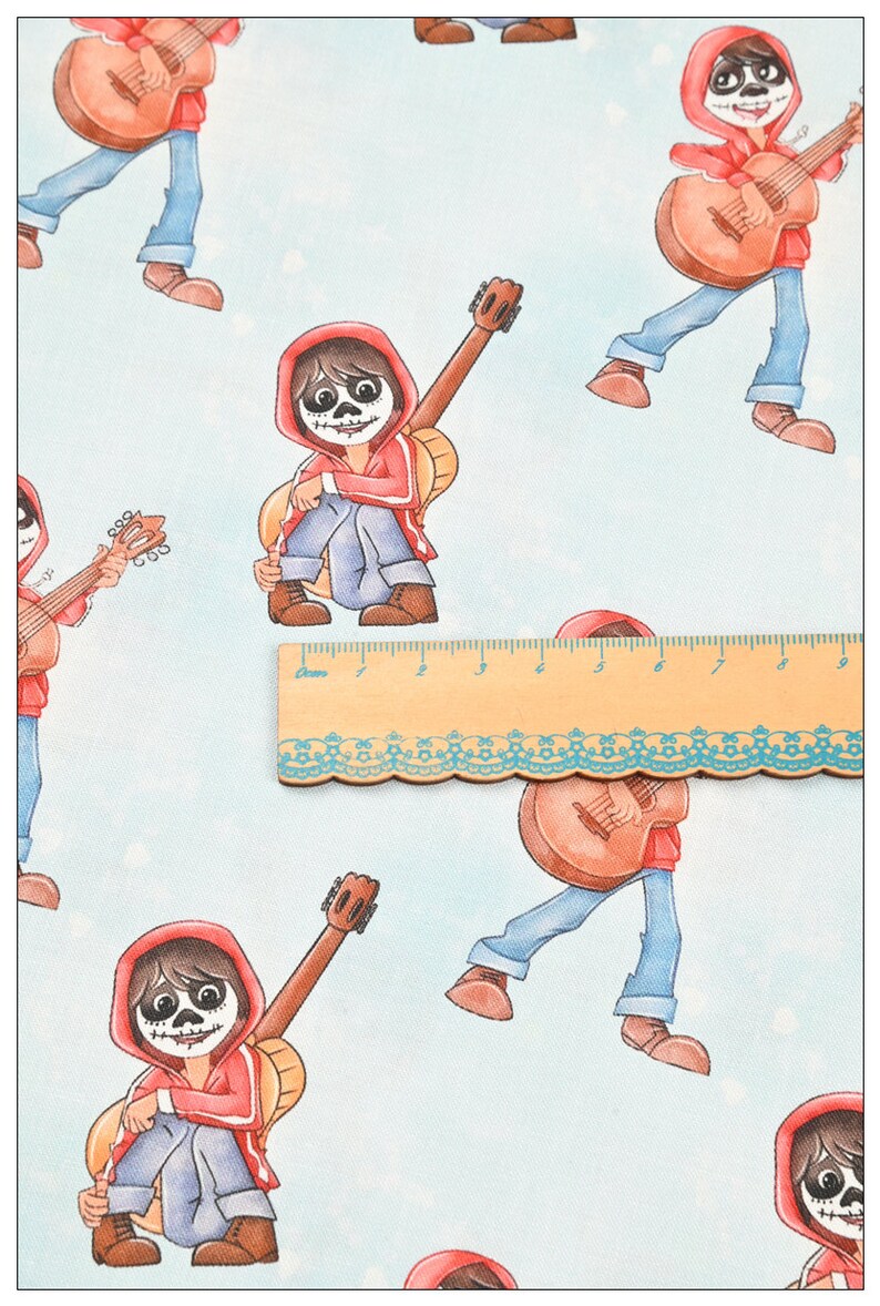 May include: A blue and white fabric with a repeating pattern of a cartoon character playing a guitar. The character is wearing a red hooded jacket, blue jeans, and a skull face paint.