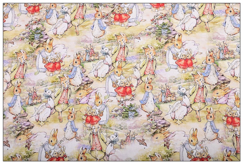 May include: A white fabric with a repeating pattern of Peter Rabbit characters. The characters include Peter Rabbit, Benjamin Bunny, and Jemima Puddle-Duck. The background is a light yellow with green and blue accents.