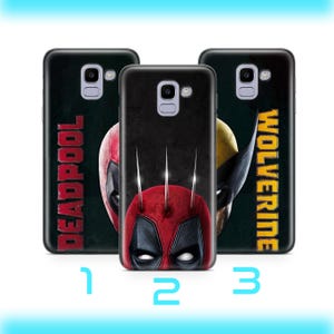 May include: Three phone cases featuring different superhero characters. The first case is black with the word "DEADPOOL" in white text. The second case is black with a red and black Deadpool character. The third case is black with the word "WOLVERINE" in yellow text.