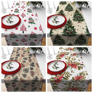 May include: Four Christmas-themed table runners with different patterns. One features red and green plaid trees and stars on a white background. Another has green Christmas trees on a beige background. The other two have pine cones and red berries.
