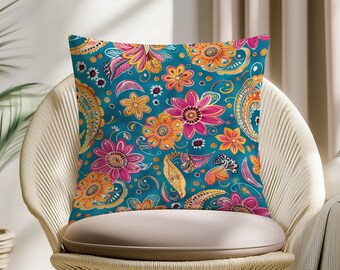 Capa de almofada com estampa paisley em tons de azul-petróleo, estilo boho floral, almofada decorativa étnica colorida, capa vibrante para sofá.