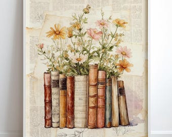 Puede incluir: Una impresión enmarcada que presenta una ilustración en acuarela de libros antiguos con flores coloridas. Los libros son de varios tonos marrones y beige, con flores en tonos amarillos, rosas y blancos. El fondo es un collage de papel envejecido.
