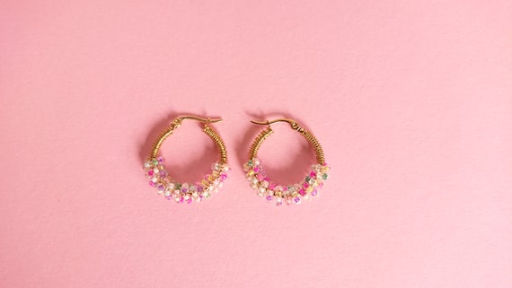 Multicolour beaded golden colour steel hoops with brass wire.