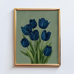 May include: A framed art print featuring a bouquet of deep blue tulips against a muted green background. The flowers have detailed petals and green stems and leaves. The frame is gold-colored.