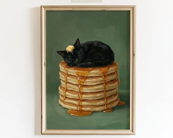 Puede incluir: Impresión enmarcada de un gato negro durmiendo sobre una pila de panqueques con sirope y mantequilla. La obra de arte tiene un fondo verde y el texto "ChicGlow" en la parte superior. El marco es de madera.