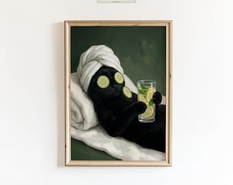 May include: A framed print depicting a black cat in a spa setting, wearing a white towel and cucumber slices on its eyes. The cat is holding a drink with lemon and mint. The print is in a gold frame and has the text "ChicGlow" at the top.