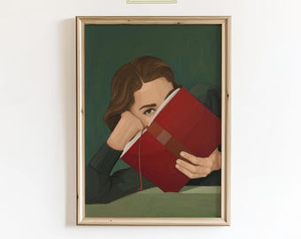 May include: A framed art print featuring a person with brown hair, resting their head on their arm while holding a large red book. The artwork has a green background and the text "ChicGlow" in the top left corner.