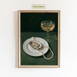 May include: A framed still life painting featuring a glass of champagne, a white plate with an oyster, and a pearl necklace. The background is a dark green, and the painting has a vintage aesthetic. The text "ChicGlow" is in the top left corner.