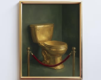 May include: A framed art print featuring a gold-colored toilet. The artwork is set against a dark green background and framed in a gold-colored frame. A red velvet rope is strung between two gold posts in front of the toilet.