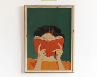 May include: A framed art print featuring a person with dark hair reading a book with an orange cover. The person's face is obscured by the book. The background is a dark green color. The text "ChicGlow" is in the top left corner.