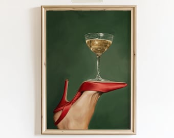 May include: A framed print featuring a red high-heeled shoe with a champagne glass balanced on it, set against a dark green background. The print has a gold frame and the text "ChicGlow" in the top corner.