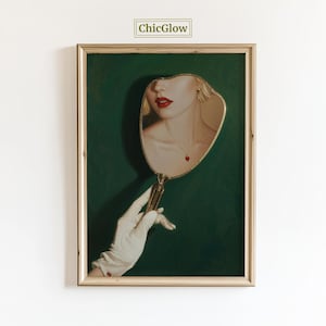 May include: A framed art print featuring a vintage-style hand mirror reflecting a woman's face with red lipstick and a heart pendant necklace. The mirror is held by a gloved hand against a dark green background. The text "ChicGlow" is in the top left corner.