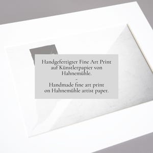 May include: A rectangular fine art print mounted in a white mat board. The print features a black and white abstract composition and includes the text: Handgefertigter Fine Art Print auf K&uuml;nstlerpapier von Hahnem&uuml;hle. Handmade fine art print on Hahnem&uuml;hle artist paper.